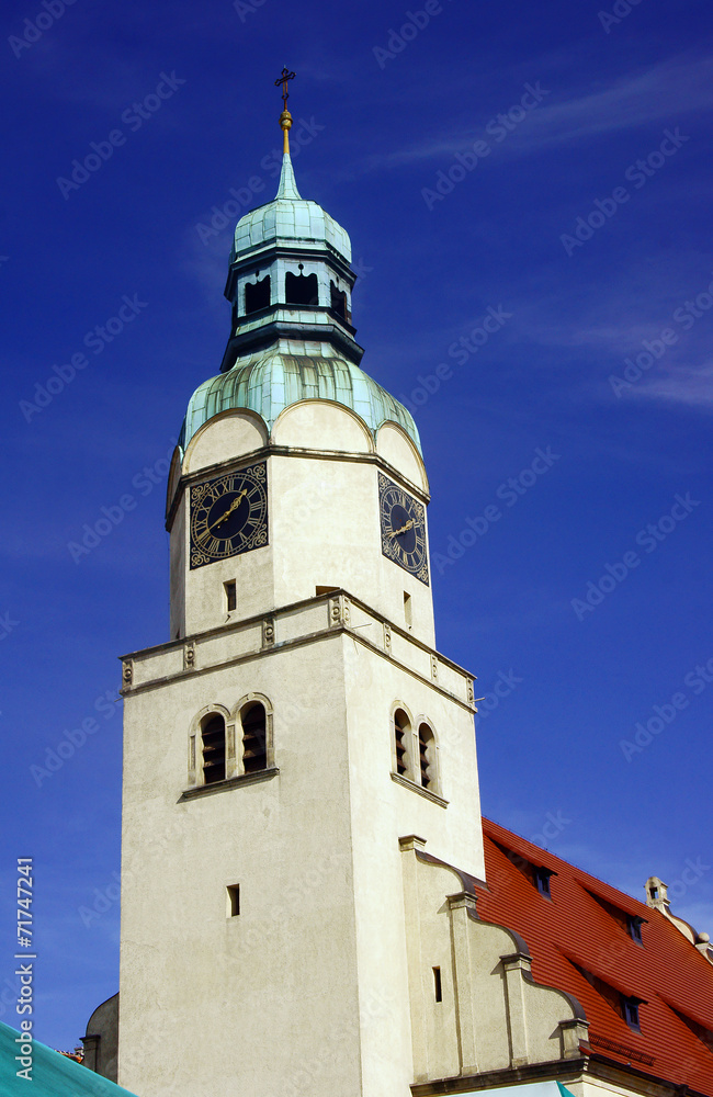 Neo-Renaissance clock tower of the church in Poznan .