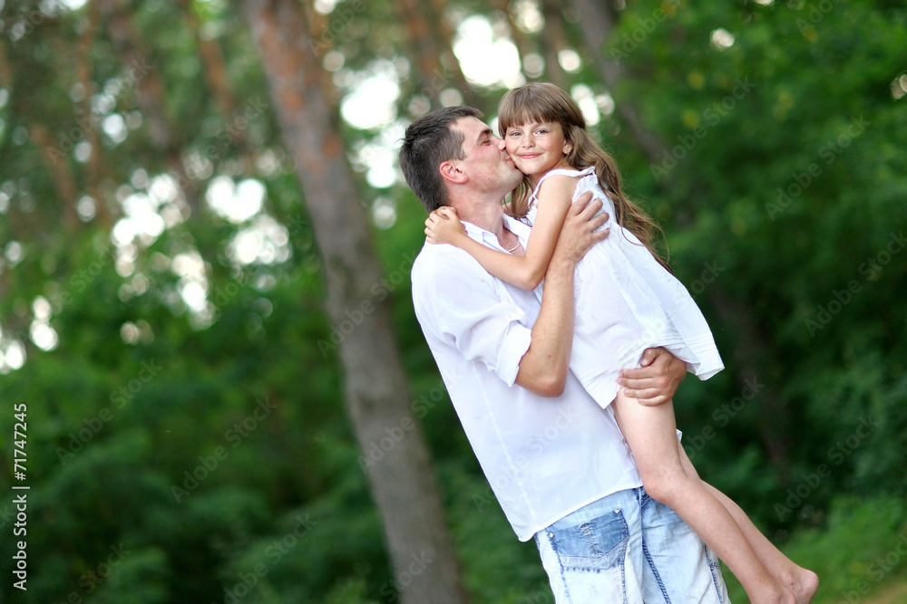 portrait of a happy family in summer nature portrait of a happy family in summer nature