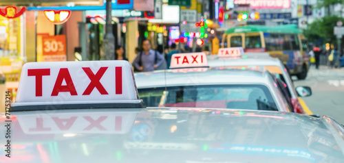 Photography HONG KONG - MAY 11: Taxis on city streets on May 11, 2014 in Hon