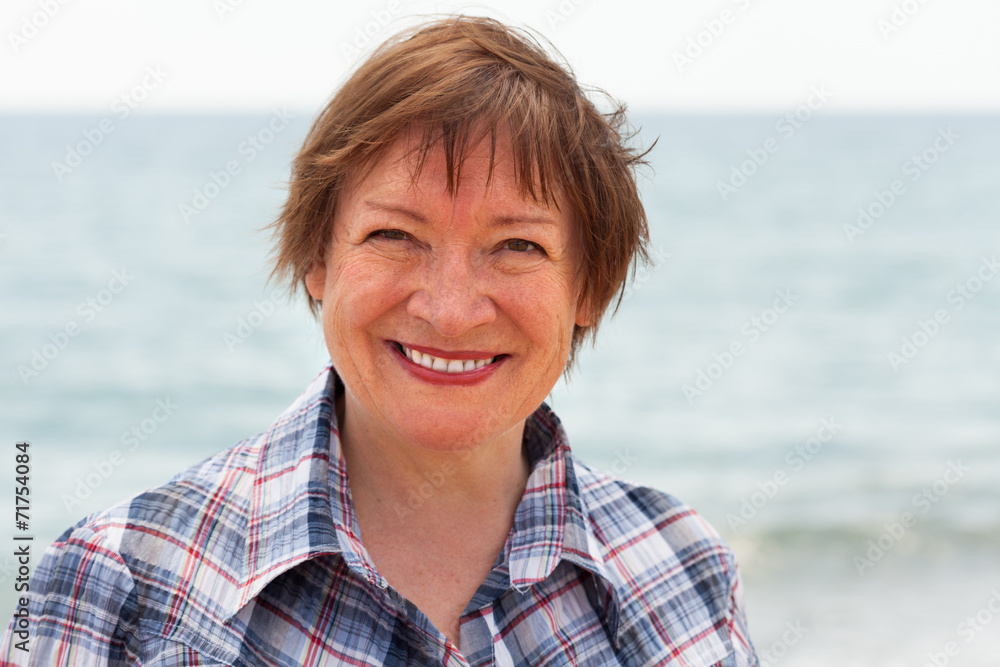middle-aged woman on beach middle-aged woman on beach