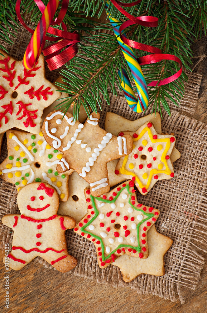 Christmas gingerbread cookies on a wooden background