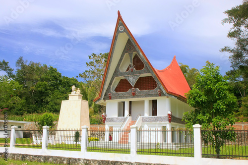 Traditional Batak house on Samosir island, Sumatra, Indonesia photo