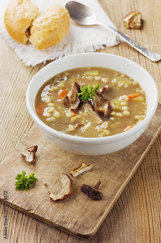 Homemade vegetarian mushroom soup with barley and vegetables