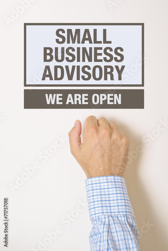 Businessman knocking on Small business advisory door