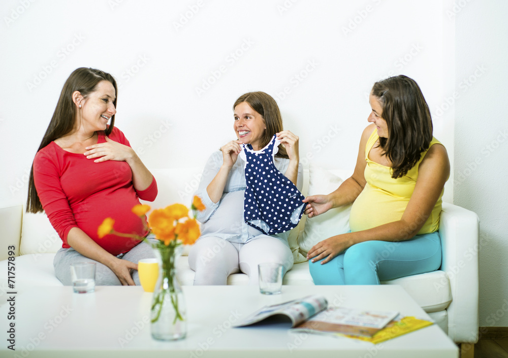 Pregnant women on sofa