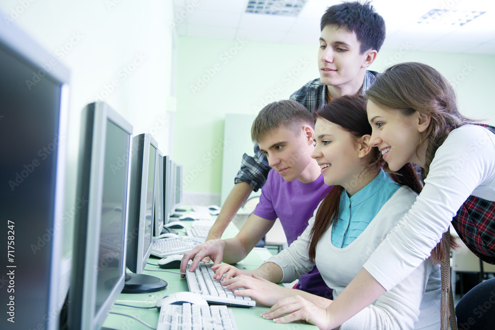 group of students studying with computer group of students studying with computer