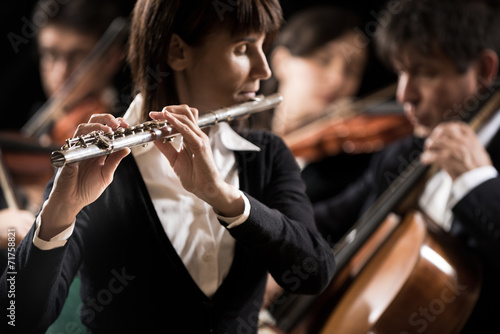 Classical music concert: flutist close-up