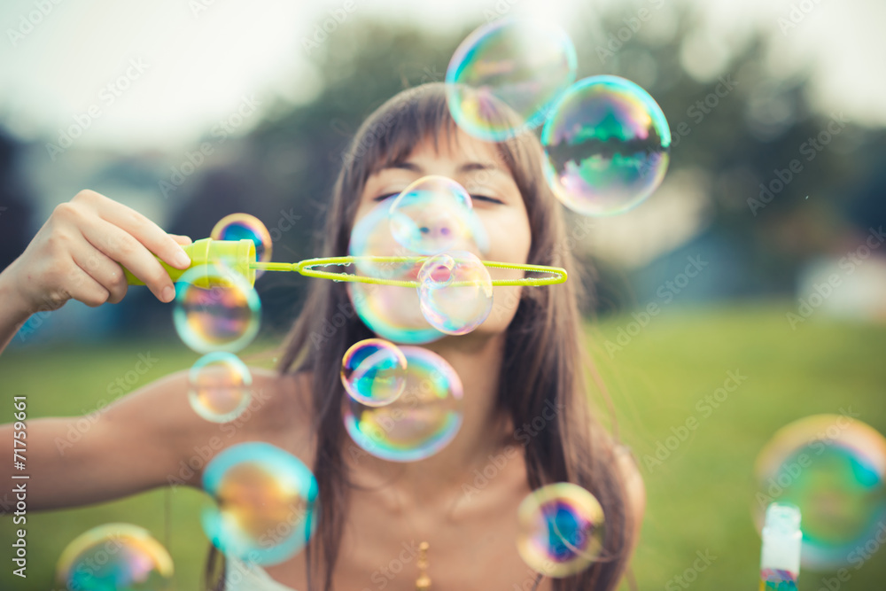 beautiful young woman with white dress blowing bubble beautiful young woman with white dress blowing bubble