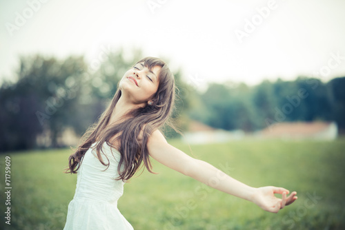 beautiful young woman with white dress