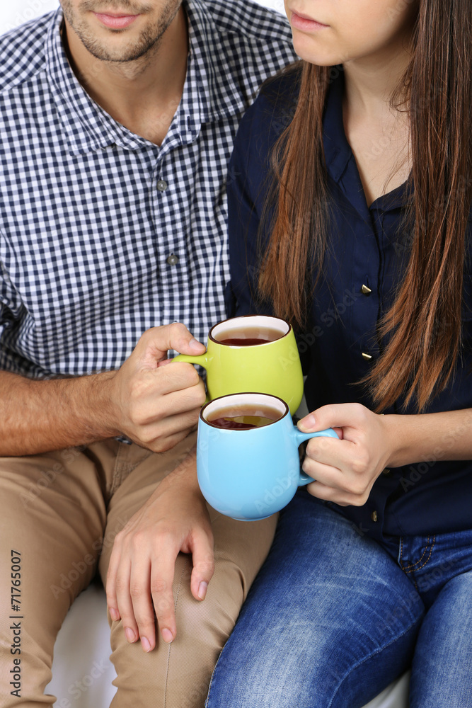 Loving couple with hot drinks Loving couple with hot drinks