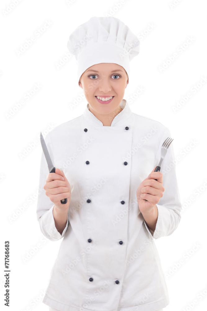 young woman in chef uniform with fork and knife isolated on whit young woman in chef uniform with fork and knife isolated on whit
