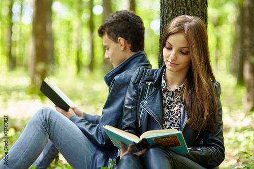 Teenagers studying together outdoor