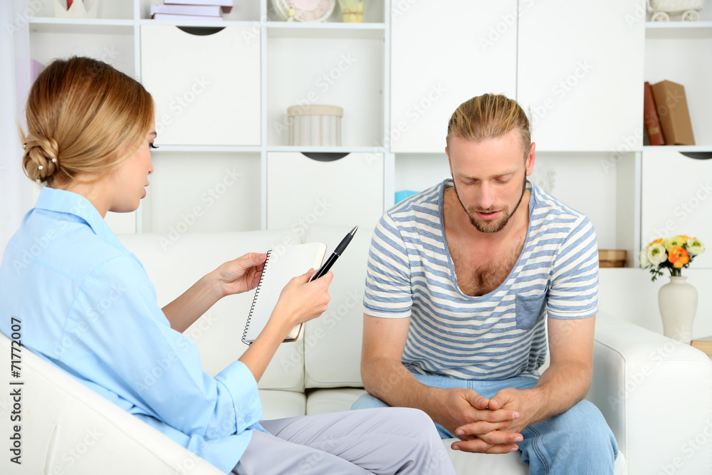 Fototapeta premium Young man on reception at psychologist