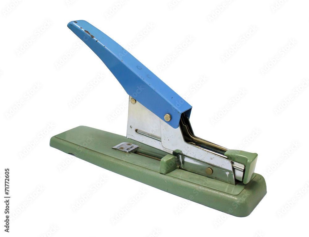 Old stapler isolated on a white background Old stapler isolated on a white background