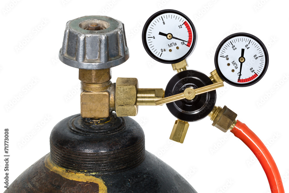 Gas pressure regulator with manometer, isolated on white backgro Gas pressure regulator with manometer, isolated on white backgro
