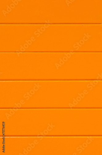 the background of new orange painted wood