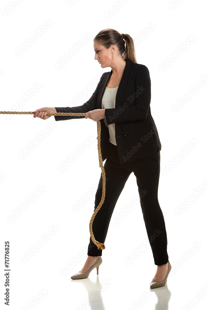 Woman Pulling Rope Stock Photo