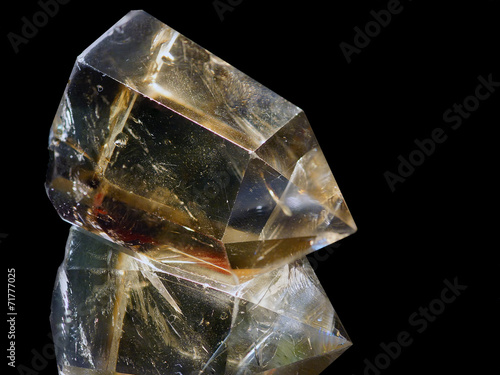 Billede på lærred crystal of topaz of tea color on a black background