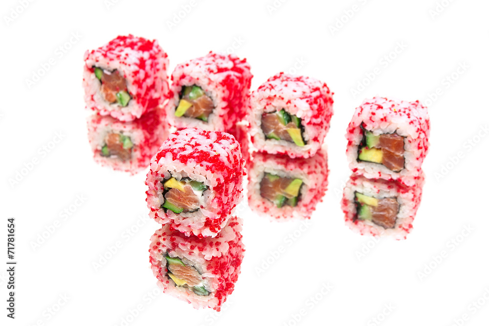 Japanese cuisine: rolls with salmon and avocado with reflection Japanese cuisine: rolls with salmon and avocado with reflection