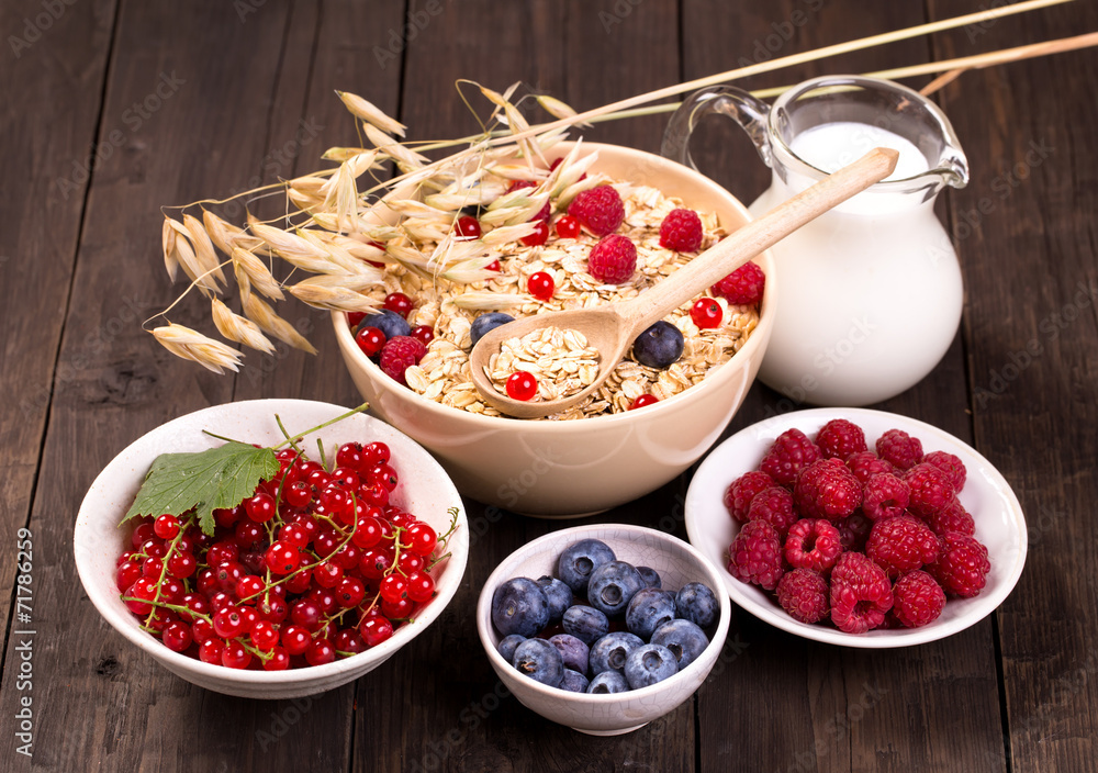 Oat flakes raspberry blueberry redcurrant and milk Oat flakes raspberry blueberry redcurrant and milk