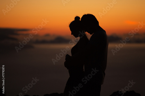 Silhouettes of the young couple
