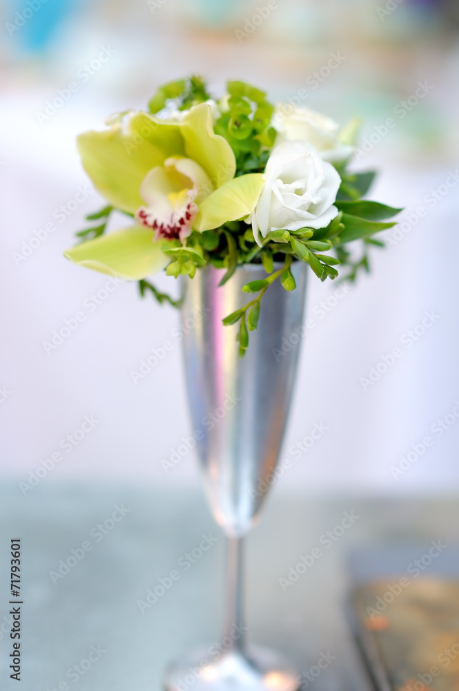 White flowers in silvery vase