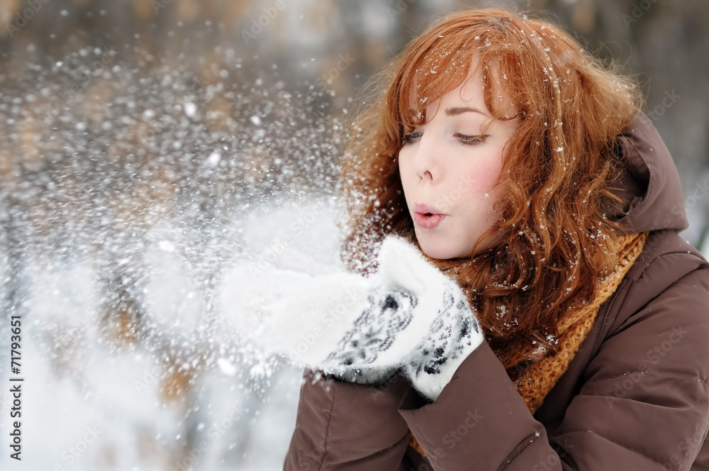Young beautiful woman having fun in winter Young beautiful woman having fun in winter