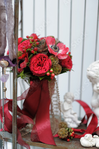 Red wedding bouquet in the flower shop