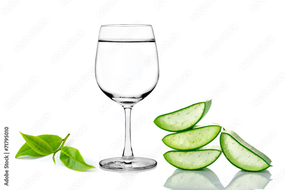 green aloe vera ,glass of water and tea isolated on white backgr