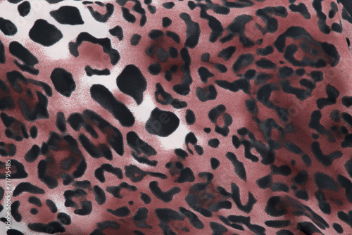 Beautiful red animal print leopard background / wallpaper