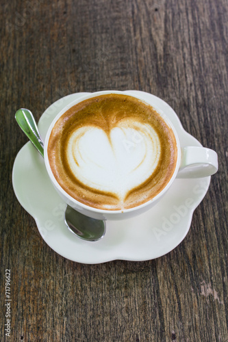 Coffee cup on old wooden