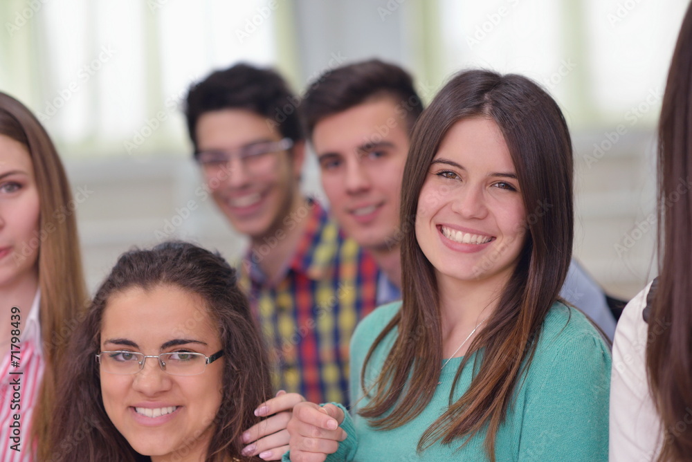 happy teens group in school happy teens group in school
