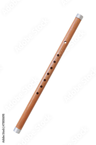 Wooden reed pipe or whistle isolated on white background