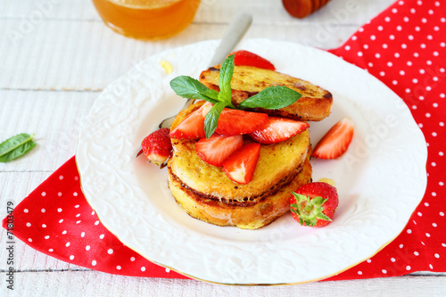 French toast with slices of berries