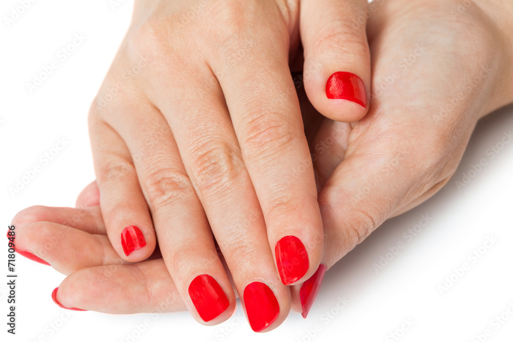 Woman with beautiful manicured red fingernails Woman with beautiful manicured red fingernails