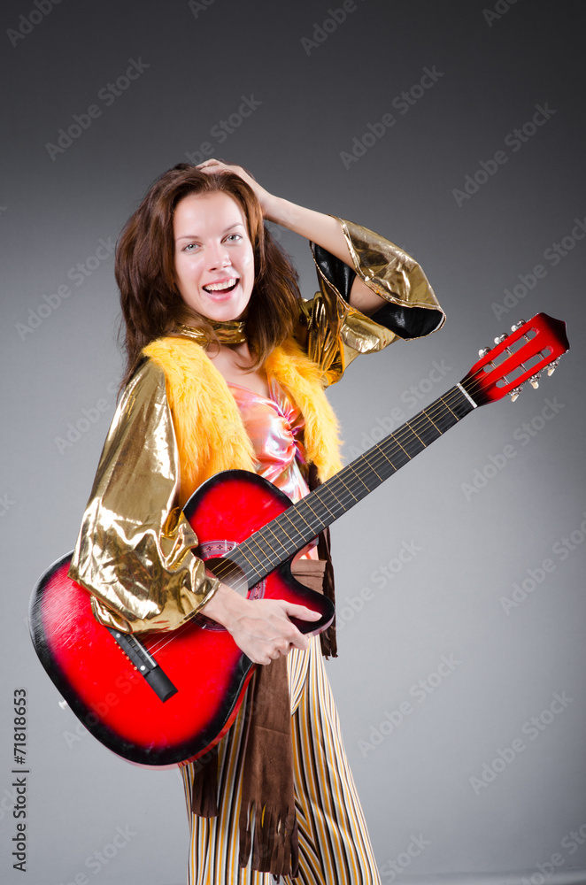 Guitar player with red instrument Guitar player with red instrument
