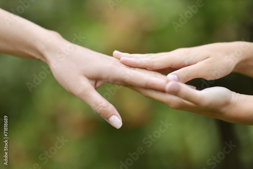Hands held together © aletia2011