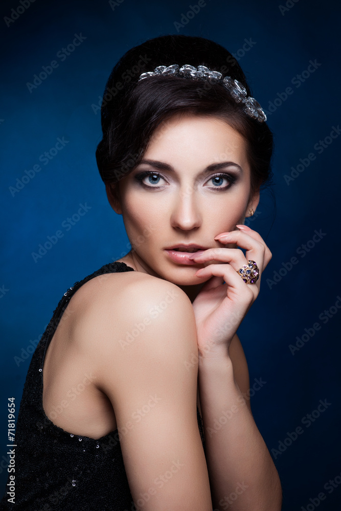 Portrait of beautiful brunette woman in black dress. Portrait of beautiful brunette woman in black dress.