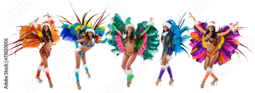 Group of smiling beautiful girls in a colorful carnival costume