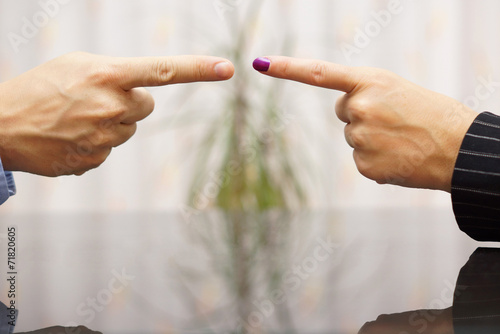 man and woman  pointing fingers at each other. Conflict concept
