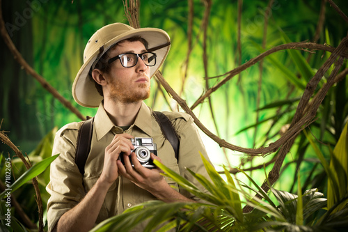 Принти на полотні Young photographer in the jungle