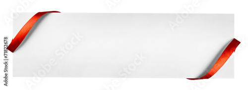 Red silk ribbon on empty paper card