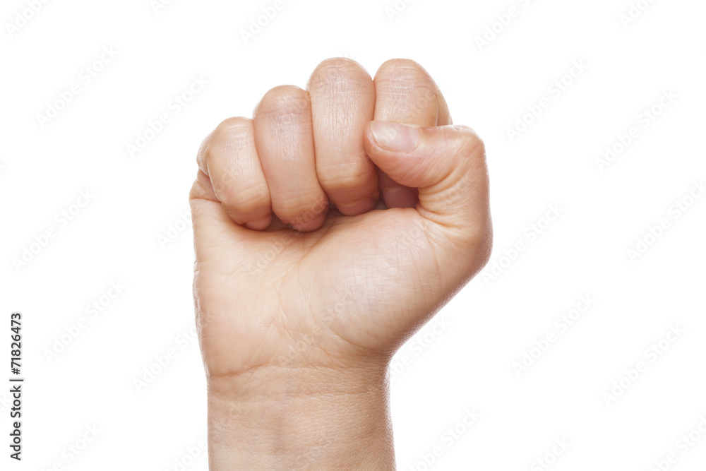 Clenched fist isolated on a white background Clenched fist isolated on a white background