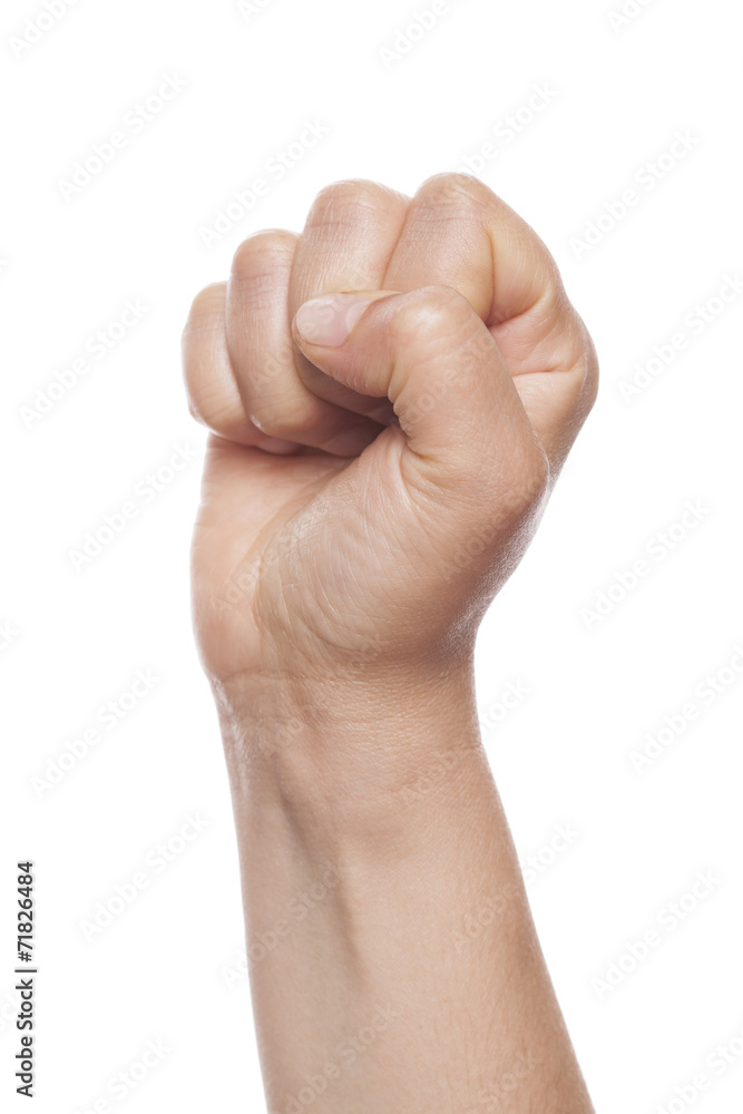 Clenched fist isolated on a white background Clenched fist isolated on a white background