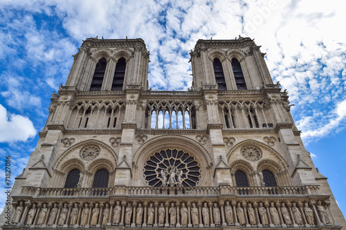 Cathedral Notre Dame in Paris on blue sky background