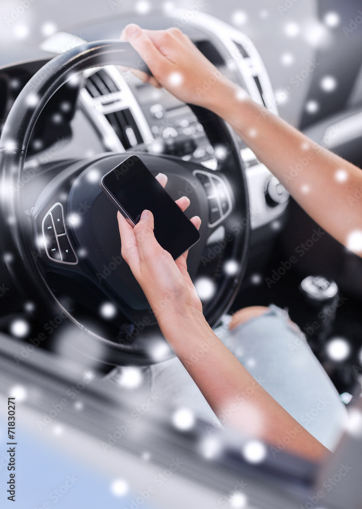 close up of woman with smartphone driving car close up of woman with smartphone driving car