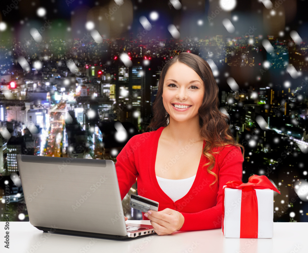 smiling woman with credit card and laptop smiling woman with credit card and laptop