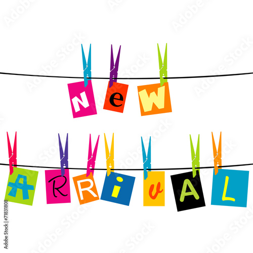 New arrival message with colored pieces of paper hanging o a rop