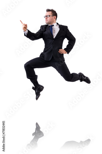 Jumping businessman isolated on the white © Elnur
