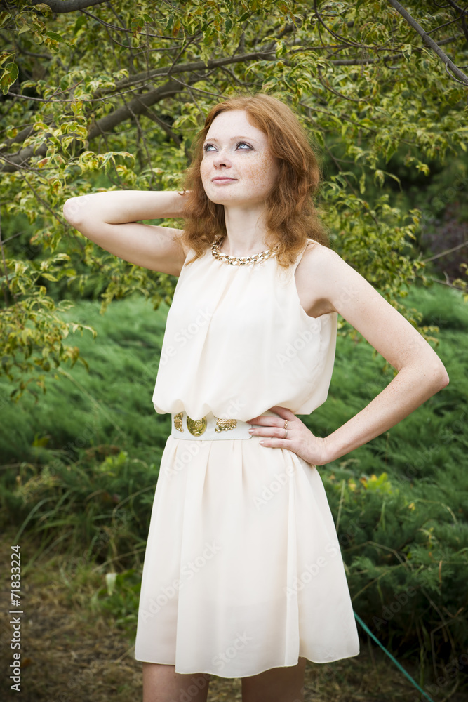 Portrait of redhead girl on nature Portrait of redhead girl on nature